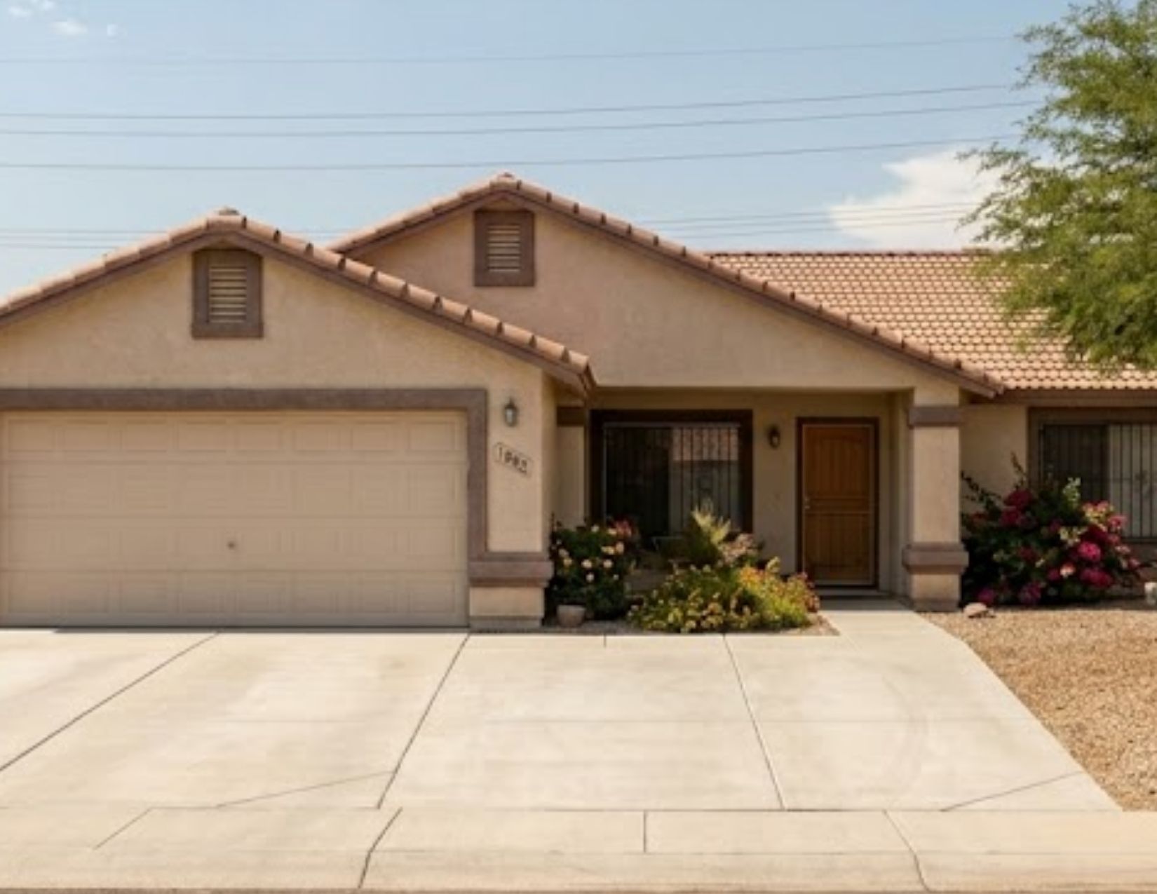 Same Yuma home after Brennan's power washing — same day